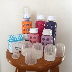 Lot of Life Factory stage 2 9oz and 4oz glass bottles with extra nipples.